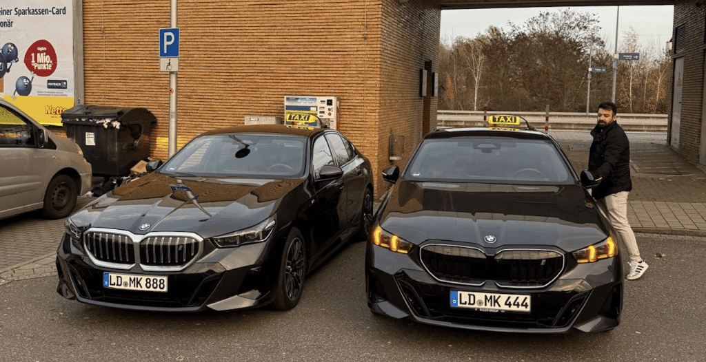 2 SUVs Mktaxibetreib landau taxi black BMW and Black mercedes